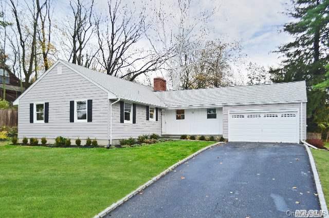 50 Little Neck Road Centerport, NY 11721 - Photo 1 of 1 a front view of a house with a yard