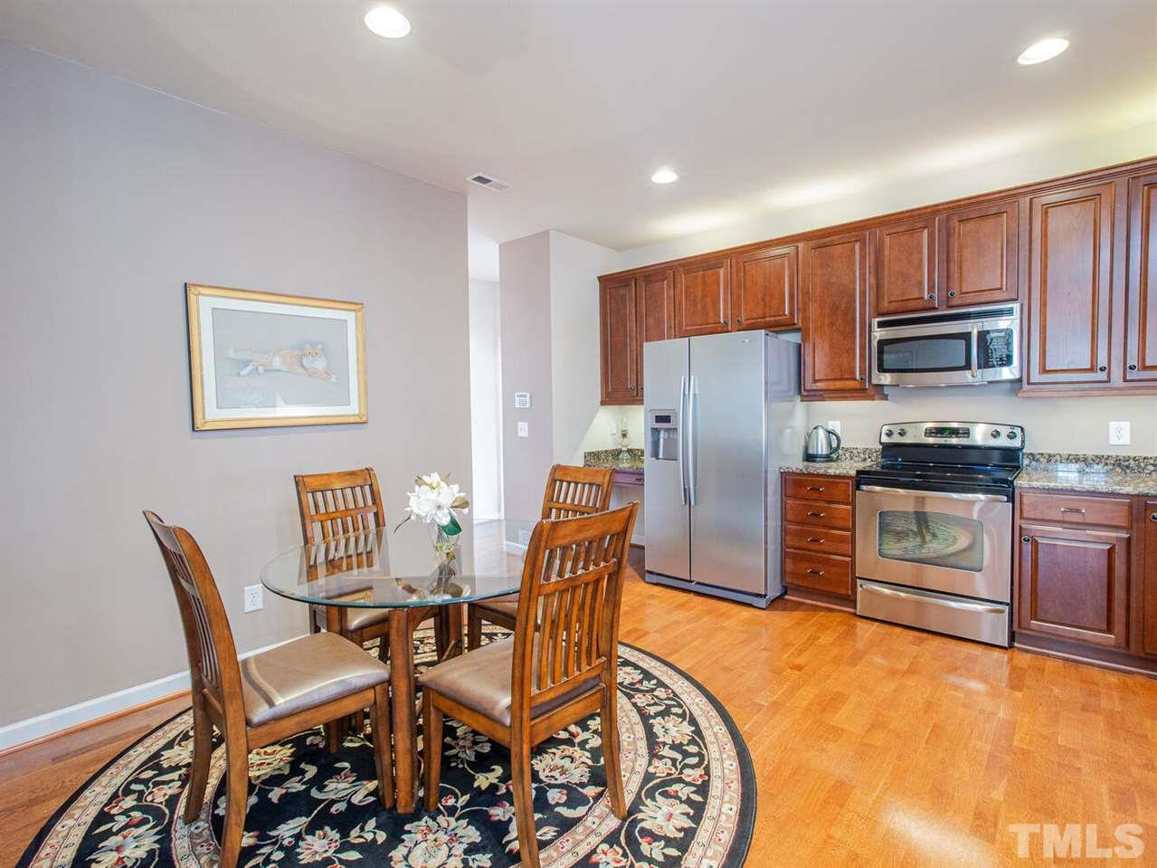 4721 Split Branch Court Raleigh, NC 27604 - Photo 15 of 26 This kitchen is beautiful, but the breakfast area adds function so you can enjoy a meal there too!