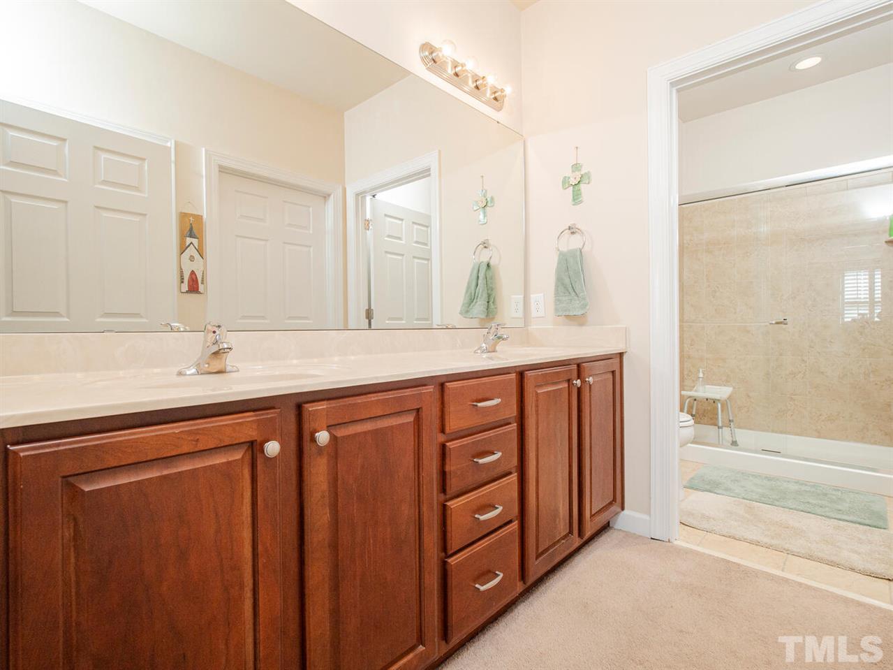 4721 Split Branch Court Raleigh, NC 27604 - Photo 24 of 26 Spacious with tile and 2 sinks. Large Walk In Closet!