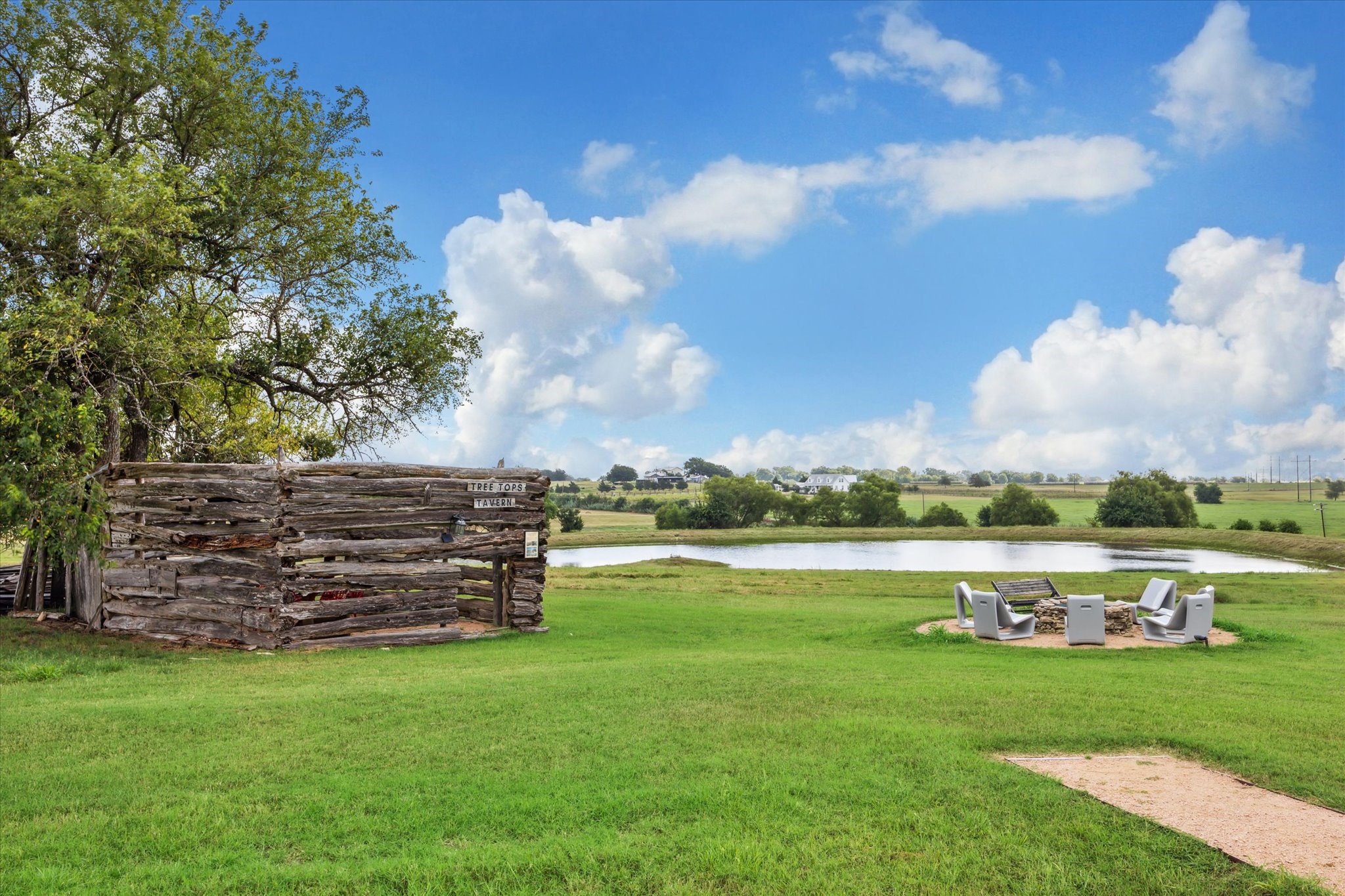 230 Vineyard View Trail Carmine, TX 78932 - Photo 6 of 12 a view of a lake with a big yard