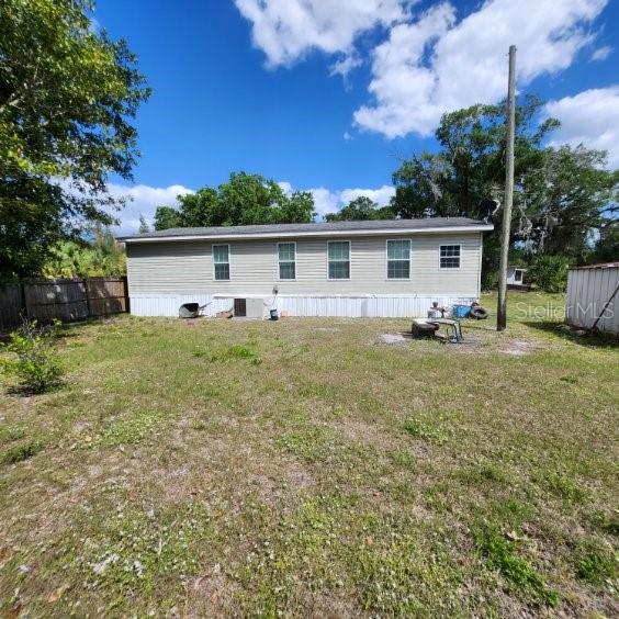 114 Singleton Avenue Arcadia, FL 34266 - Photo 8 of 9 a view of a house with a yard