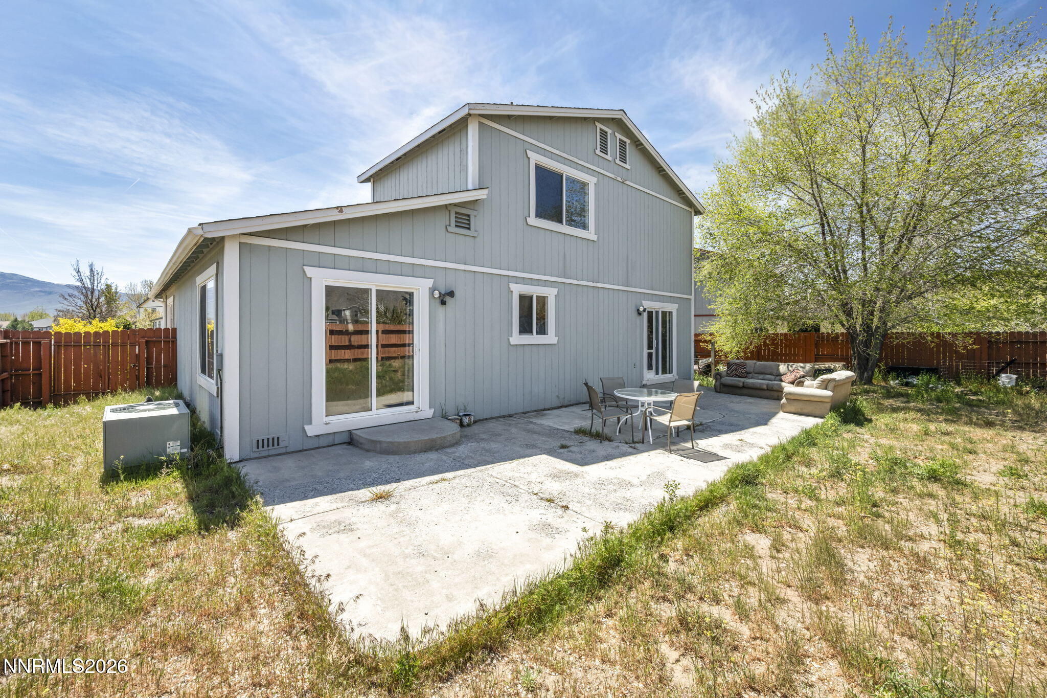 17615 Baileyville Court Reno, NV 89508 - Photo 19 of 19 a front view of a house with a yard