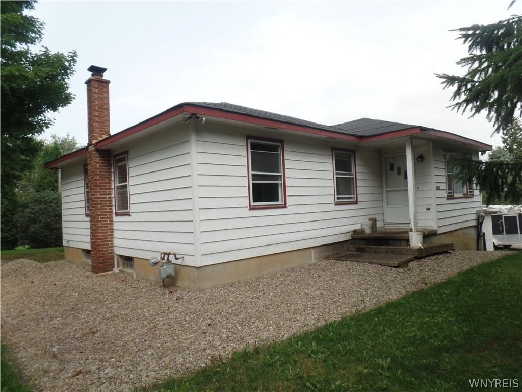 5768 Curriers Road Java, NY 14009 - Photo 1 of 1 Front view w/ new tile drainage round house.
