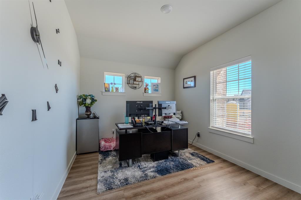 1571 Gentle Night Drive Forney, TX 75126 - Photo 12 of 15 a living room with furniture and a window