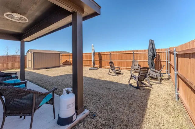 a view of a porch with chairs
