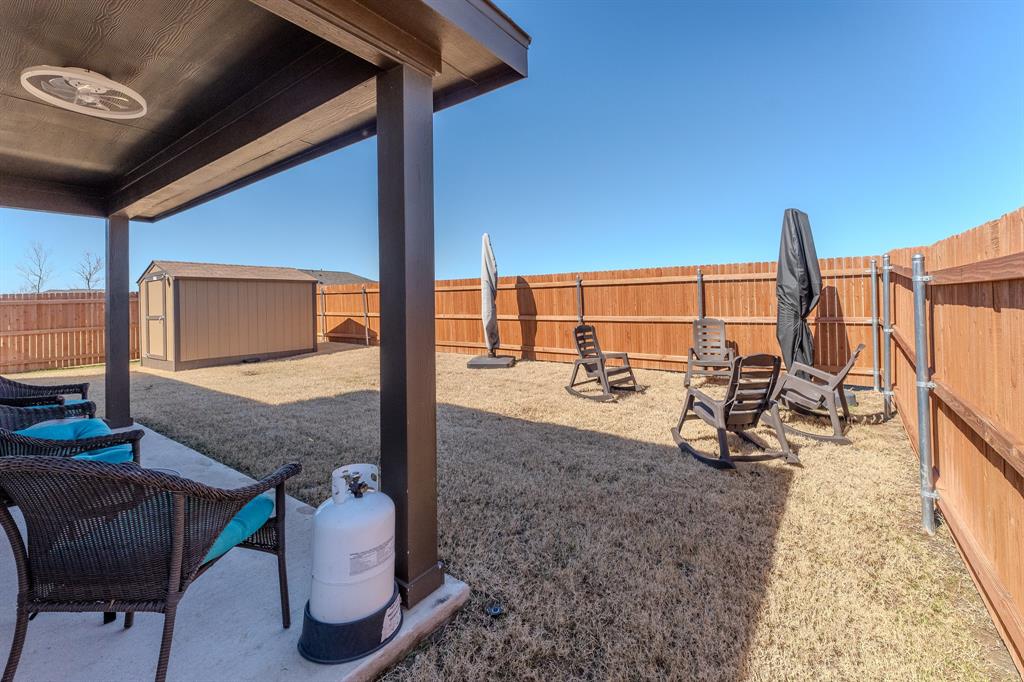 1571 Gentle Night Drive Forney, TX 75126 - Photo 14 of 15 a view of a porch with chairs