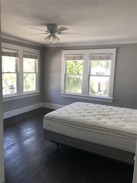 1952 Morrill Street, Unit B Sarasota, FL 34236 - Photo 9 of 12 a bedroom with a bed and a window