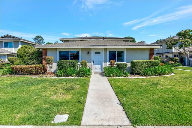 front view of a house and a yard