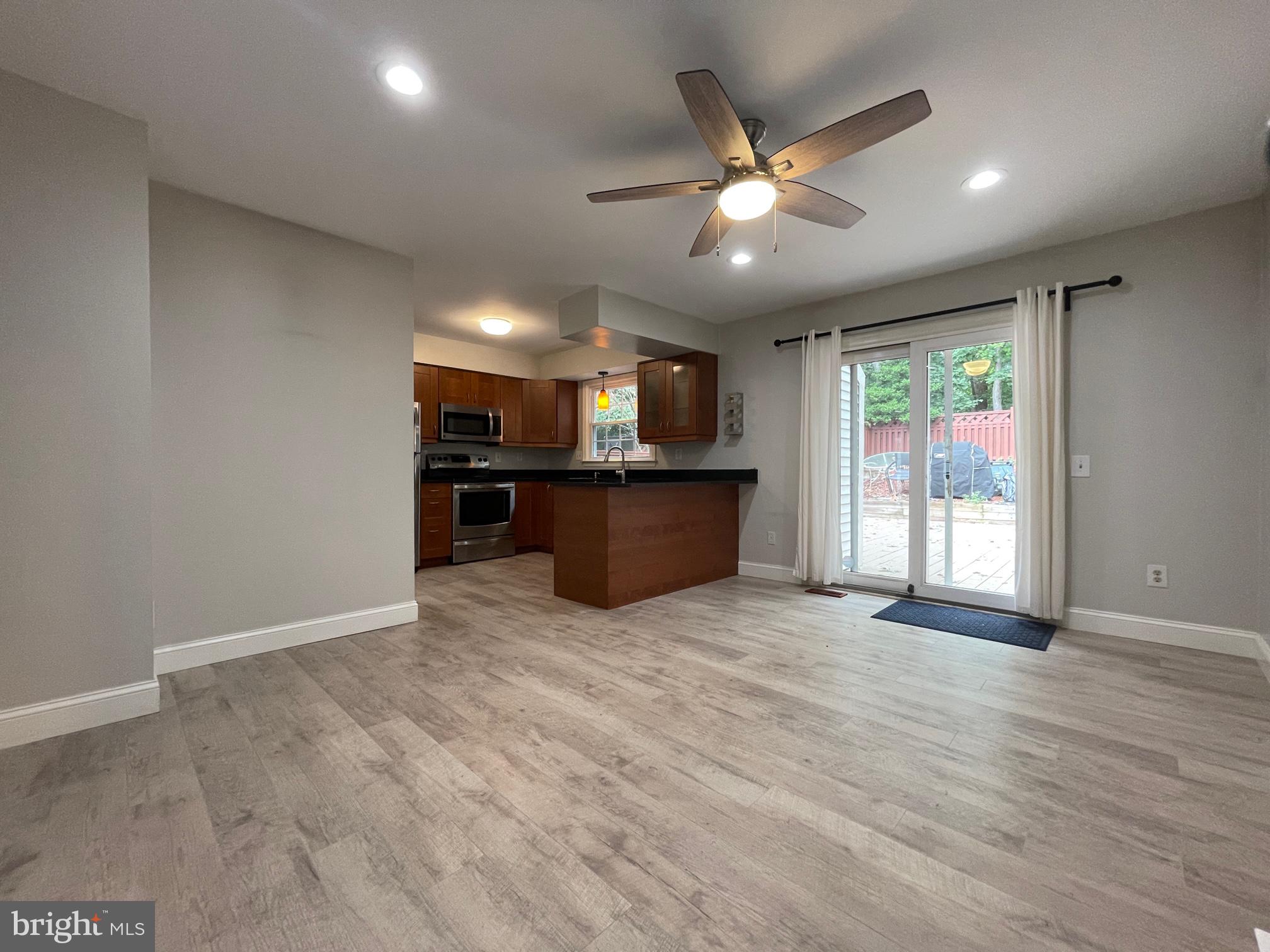 308 Crescendo Way Silver Spring, MD 20901 - Photo 11 of 26 a view of a livingroom with a kitchen