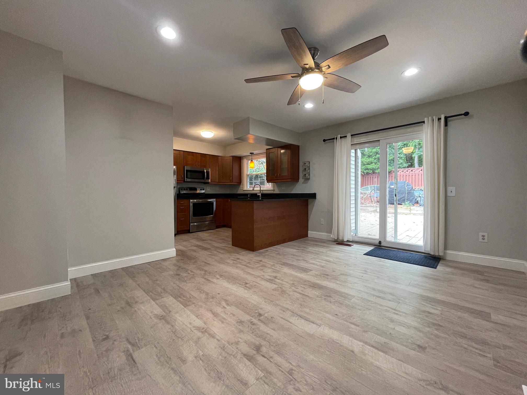 308 Crescendo Way Silver Spring, MD 20901 - Photo 10 of 26 a view of a livingroom with a kitchen