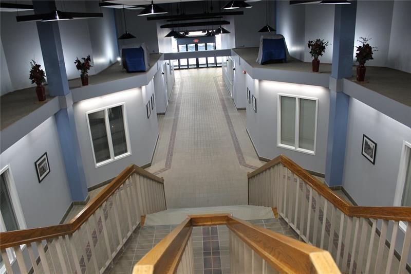 220 South Main Street Butler, PA 16001 - Photo 10 of 14 a view of a kitchen with furniture and staircase