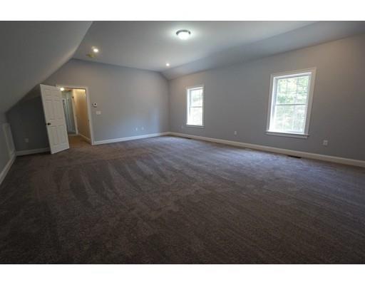 10 Rileys Way Pepperell, MA 01463 - Photo 5 of 7 a view of an empty room with a window