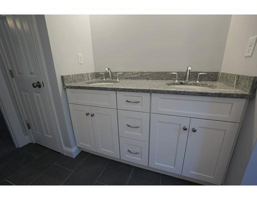 10 Rileys Way Pepperell, MA 01463 - Photo 7 of 7 a bathroom with a granite countertop sink and vanity