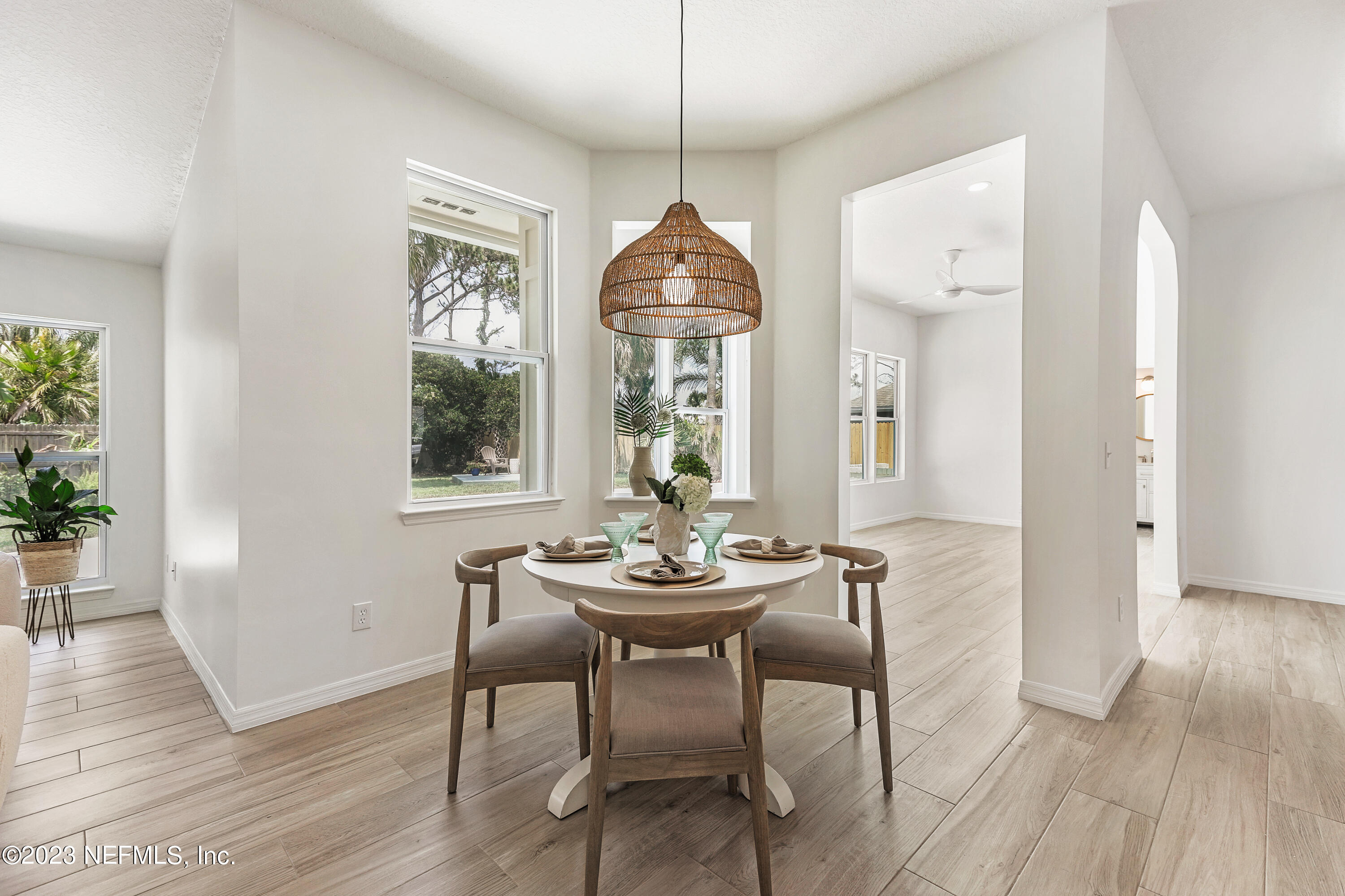 627 Cherry Street Neptune Beach, FL 32266 - Photo 14 of 51 a dining room with furniture window wooden floor
