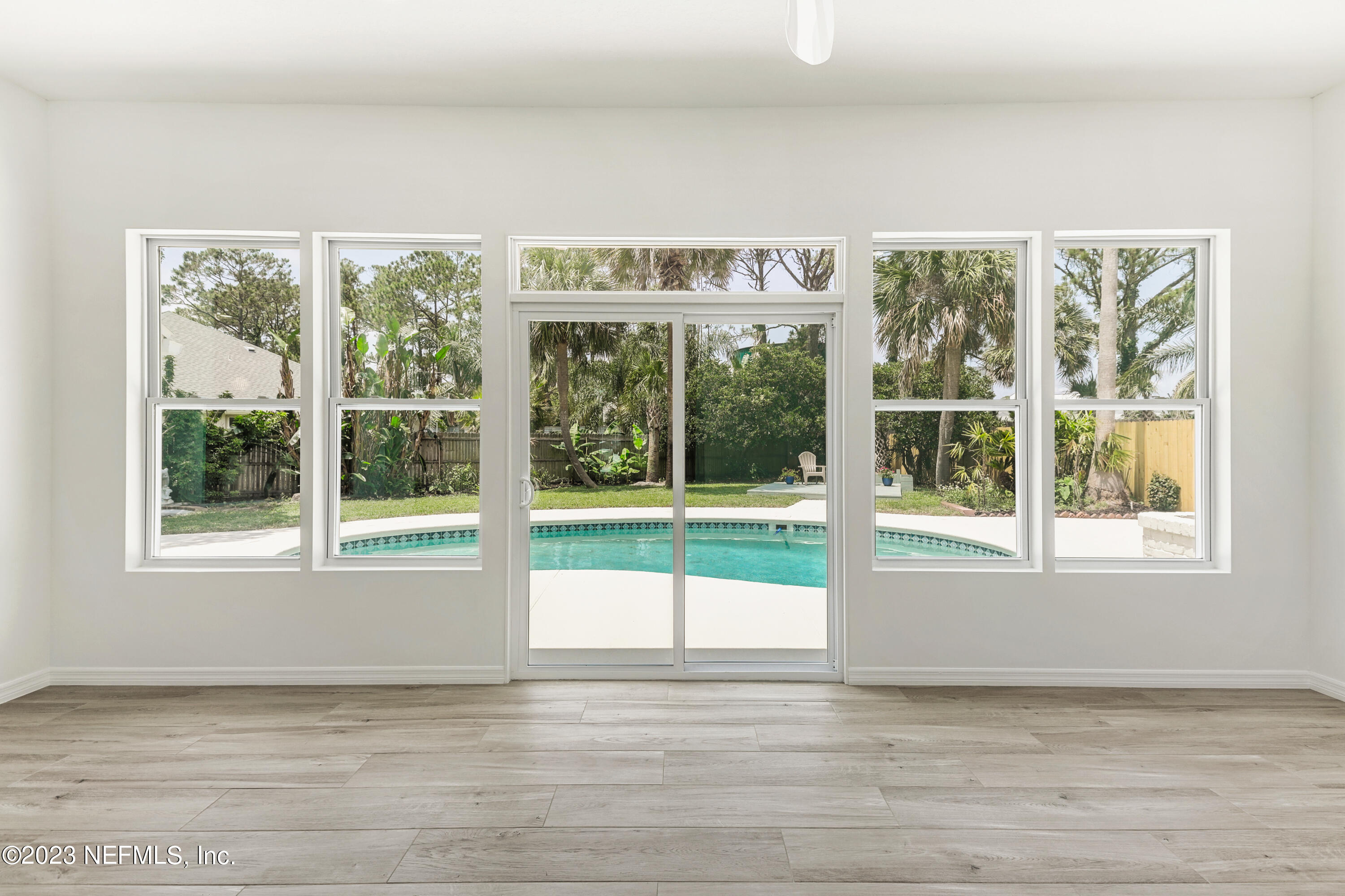 627 Cherry Street Neptune Beach, FL 32266 - Photo 21 of 51 a view of a living room and window