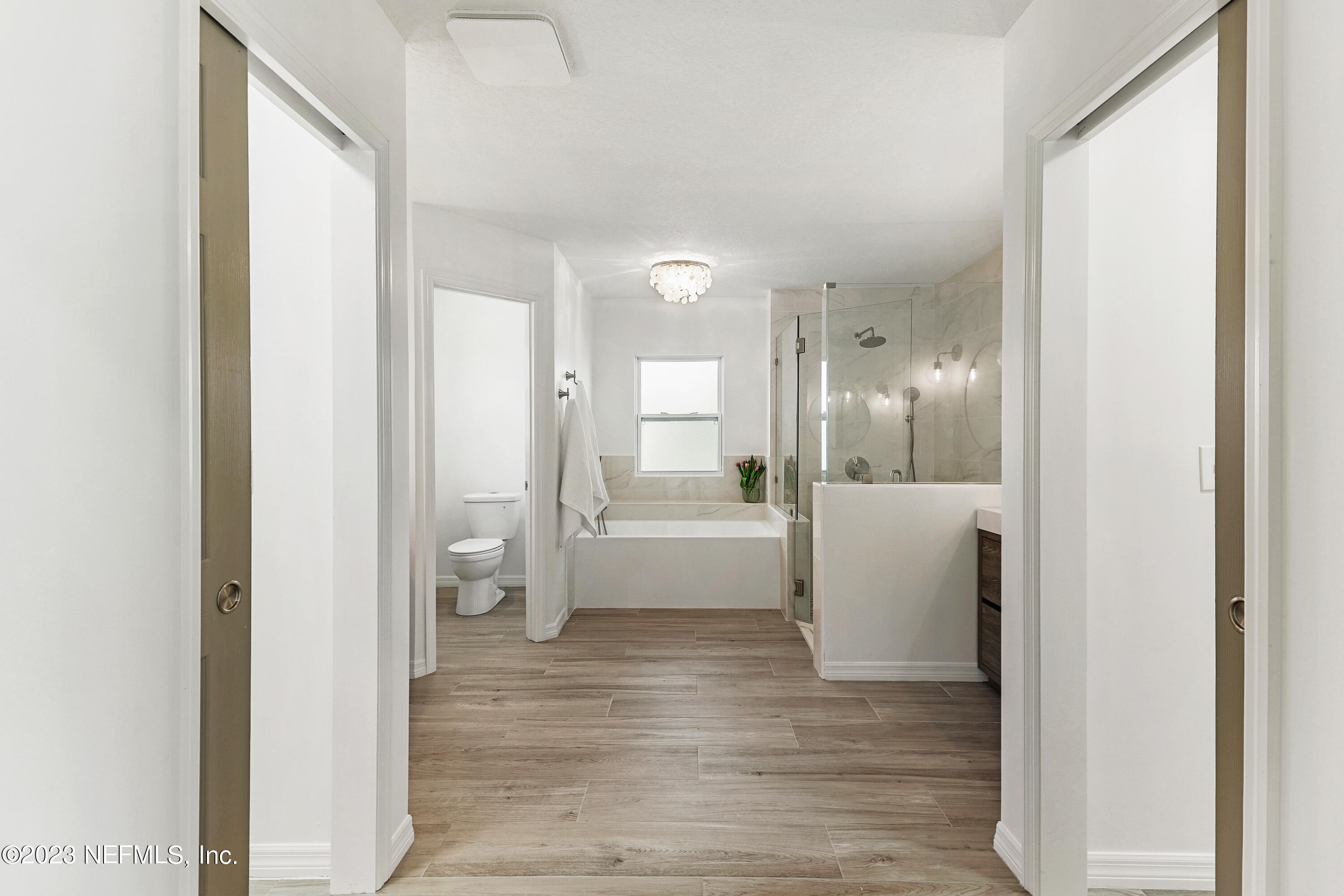 627 Cherry Street Neptune Beach, FL 32266 - Photo 30 of 51 a bathroom with a bathtub and a sink