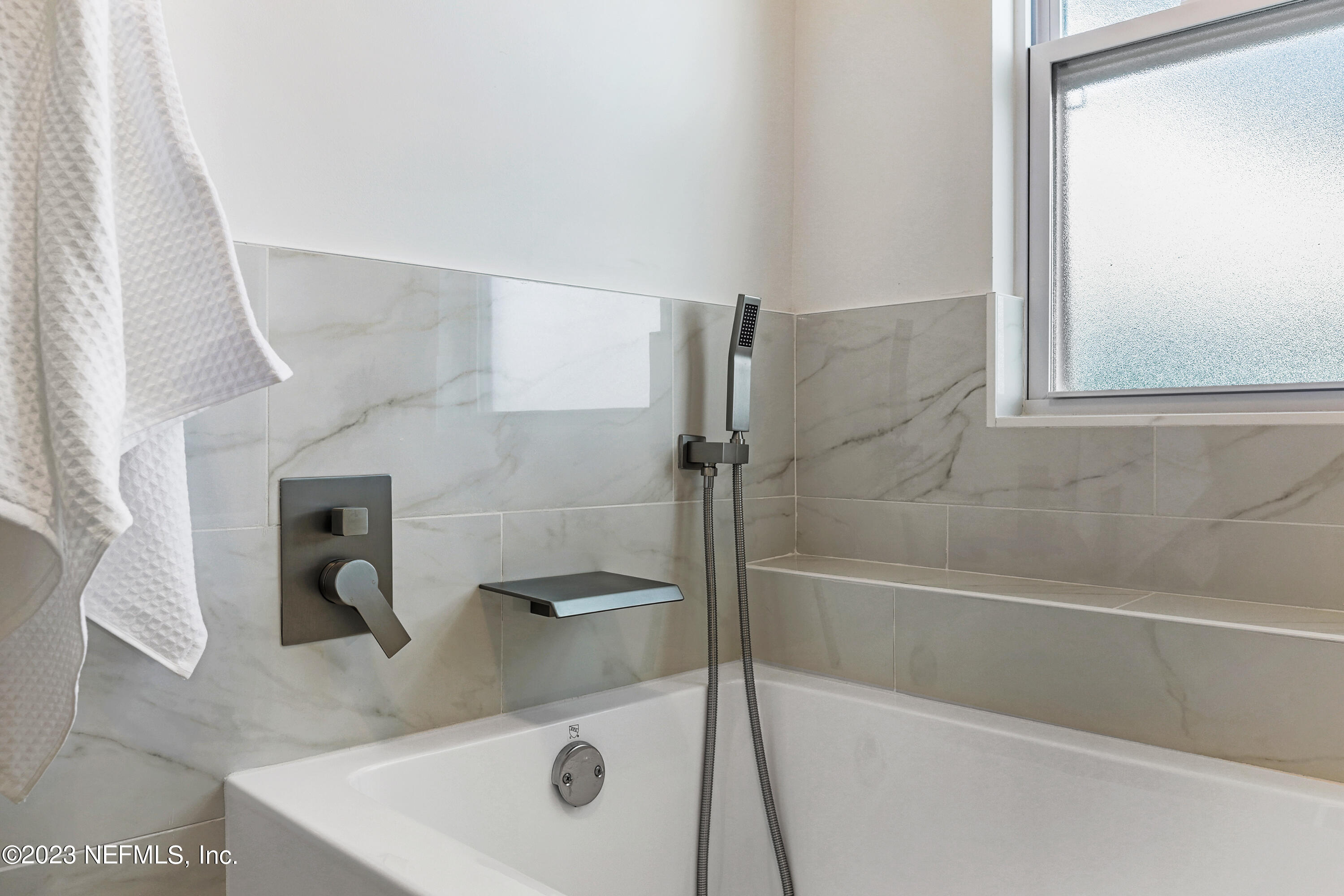 627 Cherry Street Neptune Beach, FL 32266 - Photo 37 of 51 a bathroom with a sink and a mirror