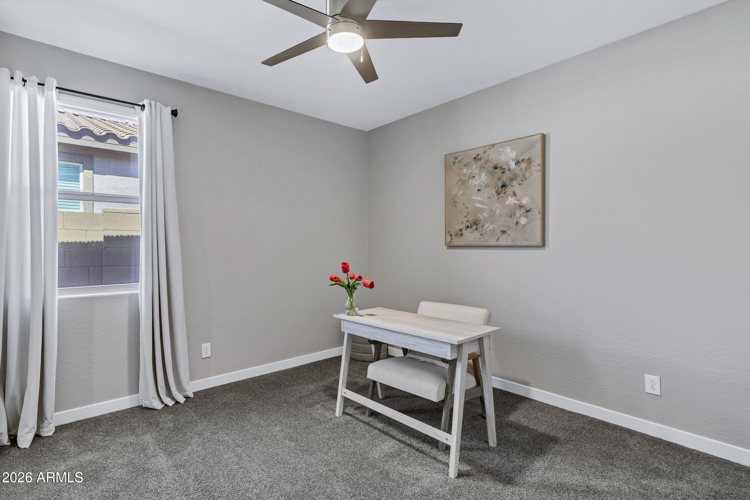 12243 East Sereno Road Gold Canyon, AZ 85118 - Photo 27 of 37 a room with a table and a window