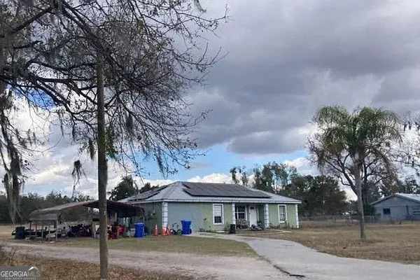 a front view of house with yard