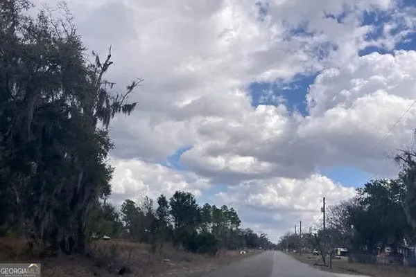 a view of a city with lots of trees