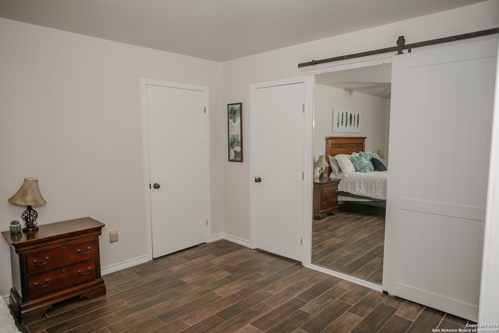 456 Margo Drive Pearsall, TX 78061 - Photo 14 of 40 a view of a bedroom from the hallway