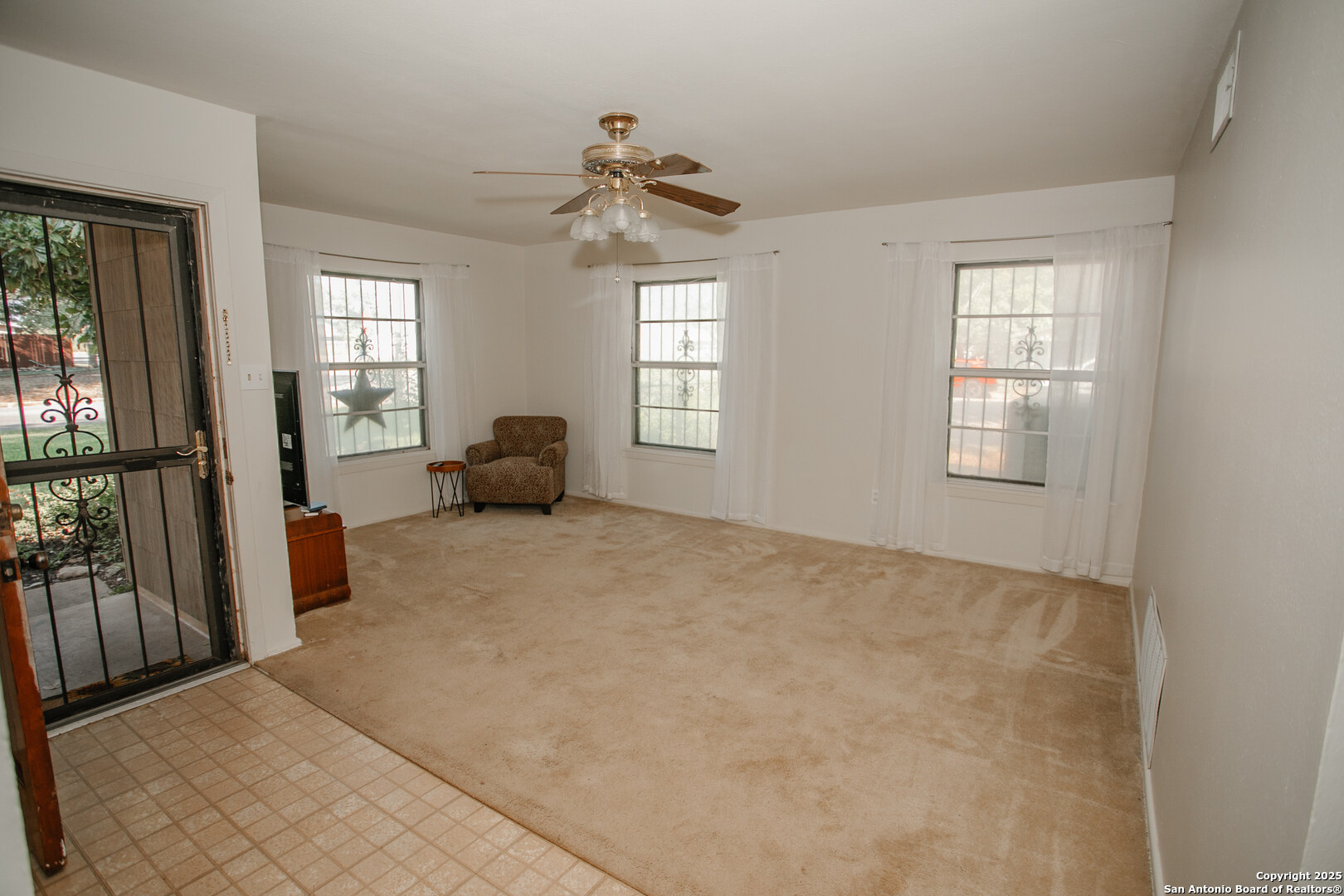 456 Margo Drive Pearsall, TX 78061 - Photo 2 of 40 a living room with furniture and a window