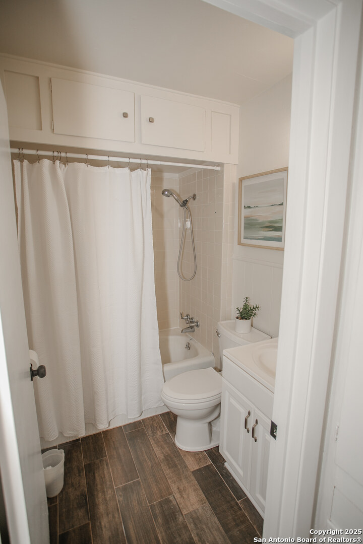 456 Margo Drive Pearsall, TX 78061 - Photo 22 of 40 a bathroom with a sink a toilet and shower