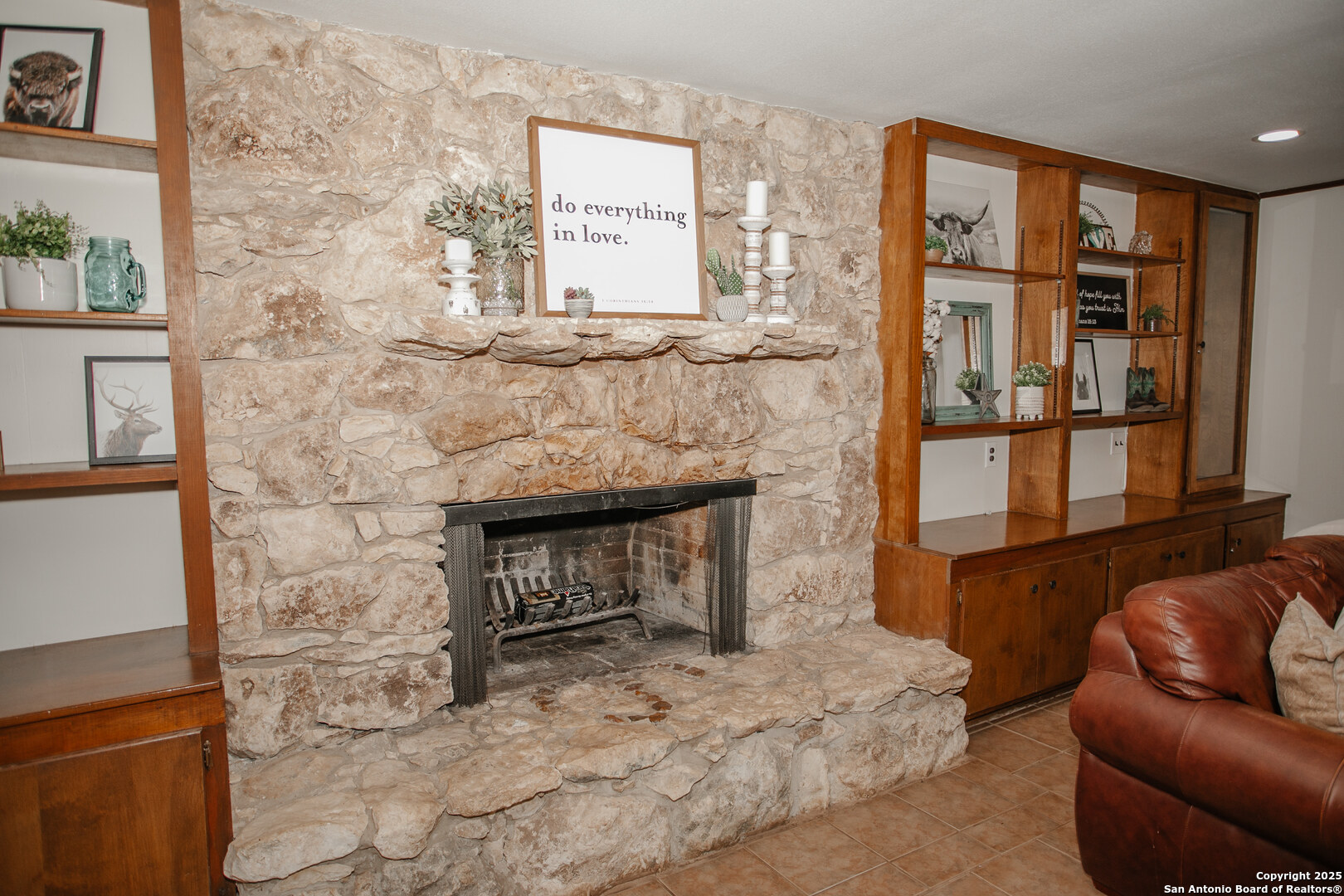 456 Margo Drive Pearsall, TX 78061 - Photo 27 of 40 a living room with furniture window and a fireplace