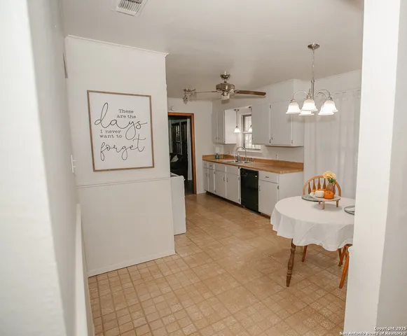 a room with table and sink