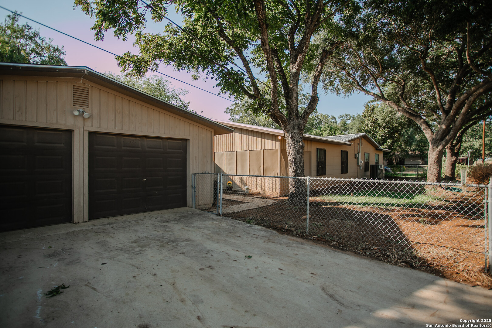 456 Margo Drive Pearsall, TX 78061 - Photo 40 of 40 a house with trees in the background