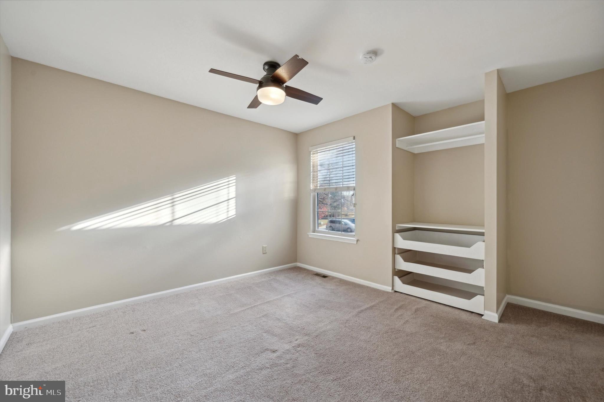 9 Meadow Lane Delran, NJ 08075 - Photo 8 of 15 a view of an empty room with a window