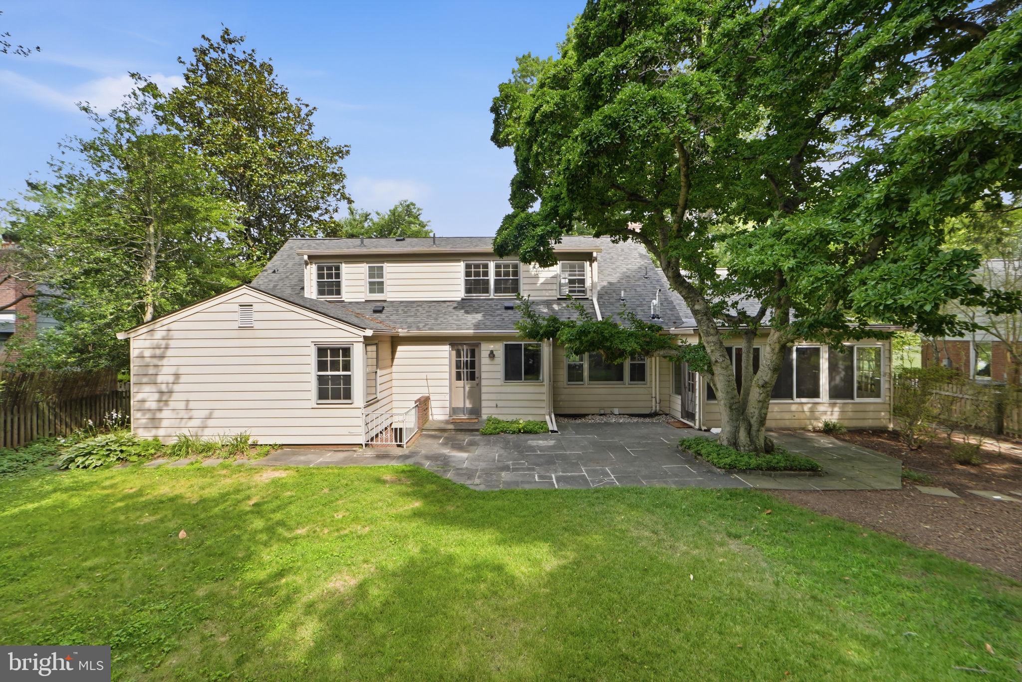 5910 Overlea Road Bethesda, MD 20816 - Photo 54 of 56 a view of a house with a yard and sitting area