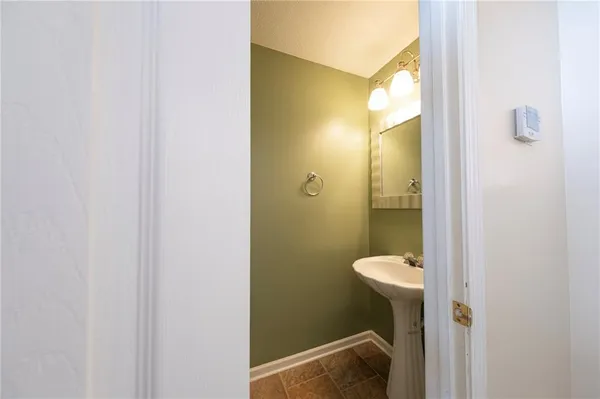 a bathroom with a shower and toilet