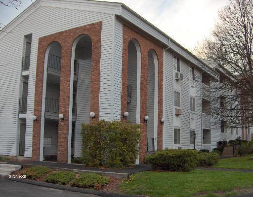 81 Coalpit Hill Road, Unit O Danbury, CT 06810 - Photo 1 of 1 a front view of a house with garden