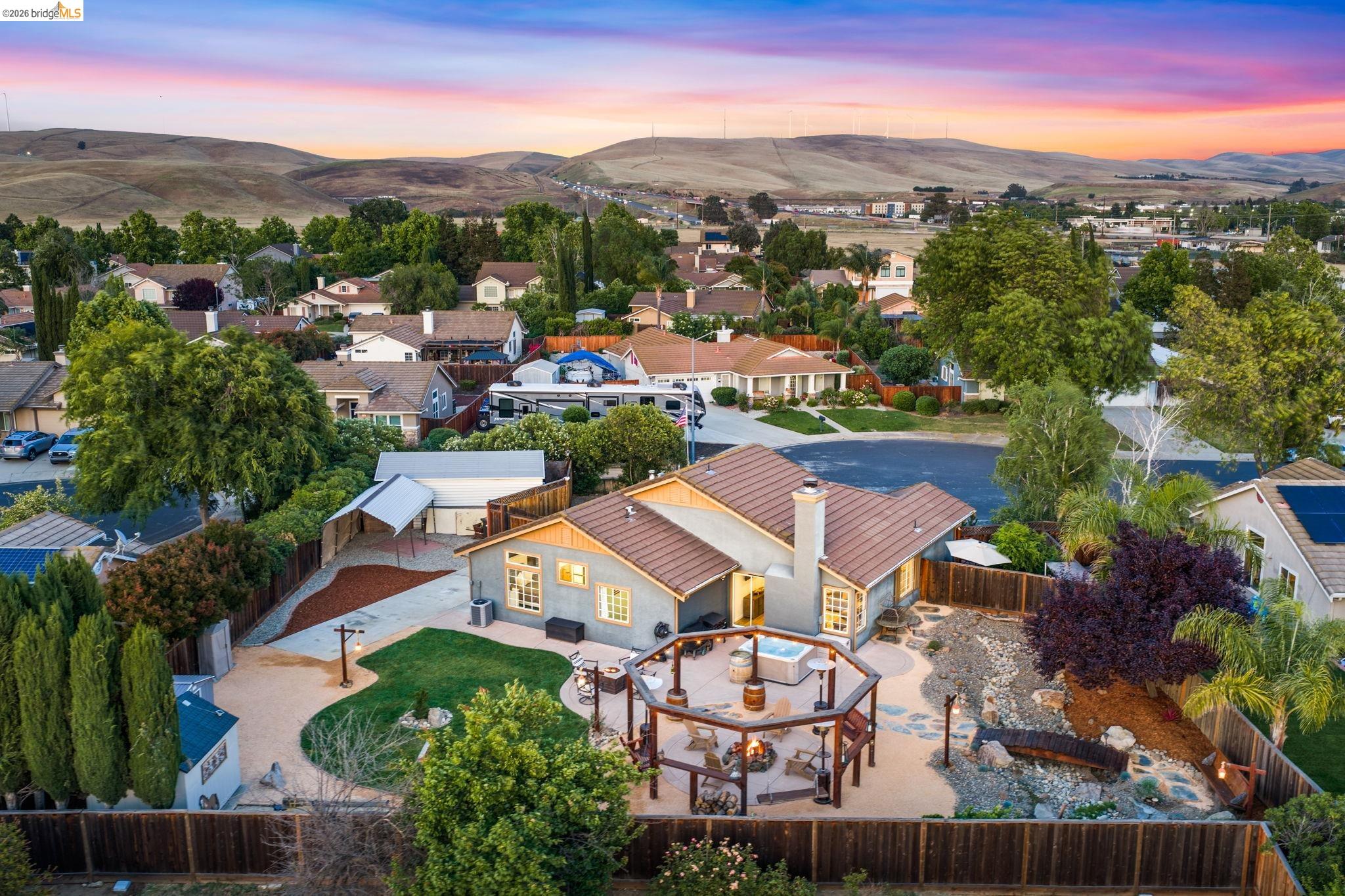 1186 El Rio Court Livermore, CA 94551 - Photo 48 of 60 Expansive backyard featuring an octagonal pergola, a spa, a fire pit, and a water feature