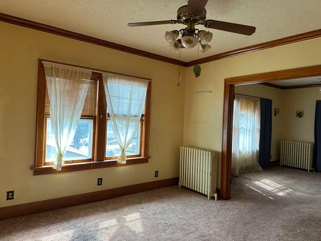 a view of a livingroom with a staircase