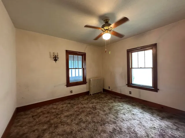 a view of an empty room with window