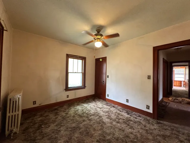 wooden floor and window in a room