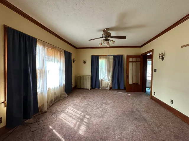 a view of a livingroom with a staircase
