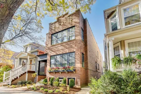 a view of a building with a street