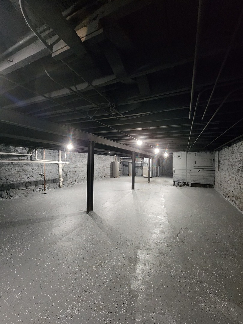 8900 South Normal Avenue Chicago, IL 60620 - Photo 20 of 28 a view of empty room with wooden ceiling