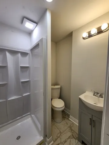 a bathroom with a sink and a toilet