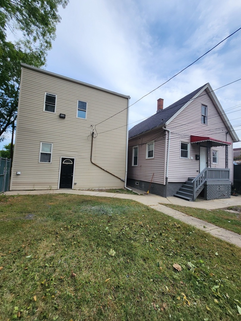 8900 South Normal Avenue Chicago, IL 60620 - Photo 28 of 28 a view of a house with backyard