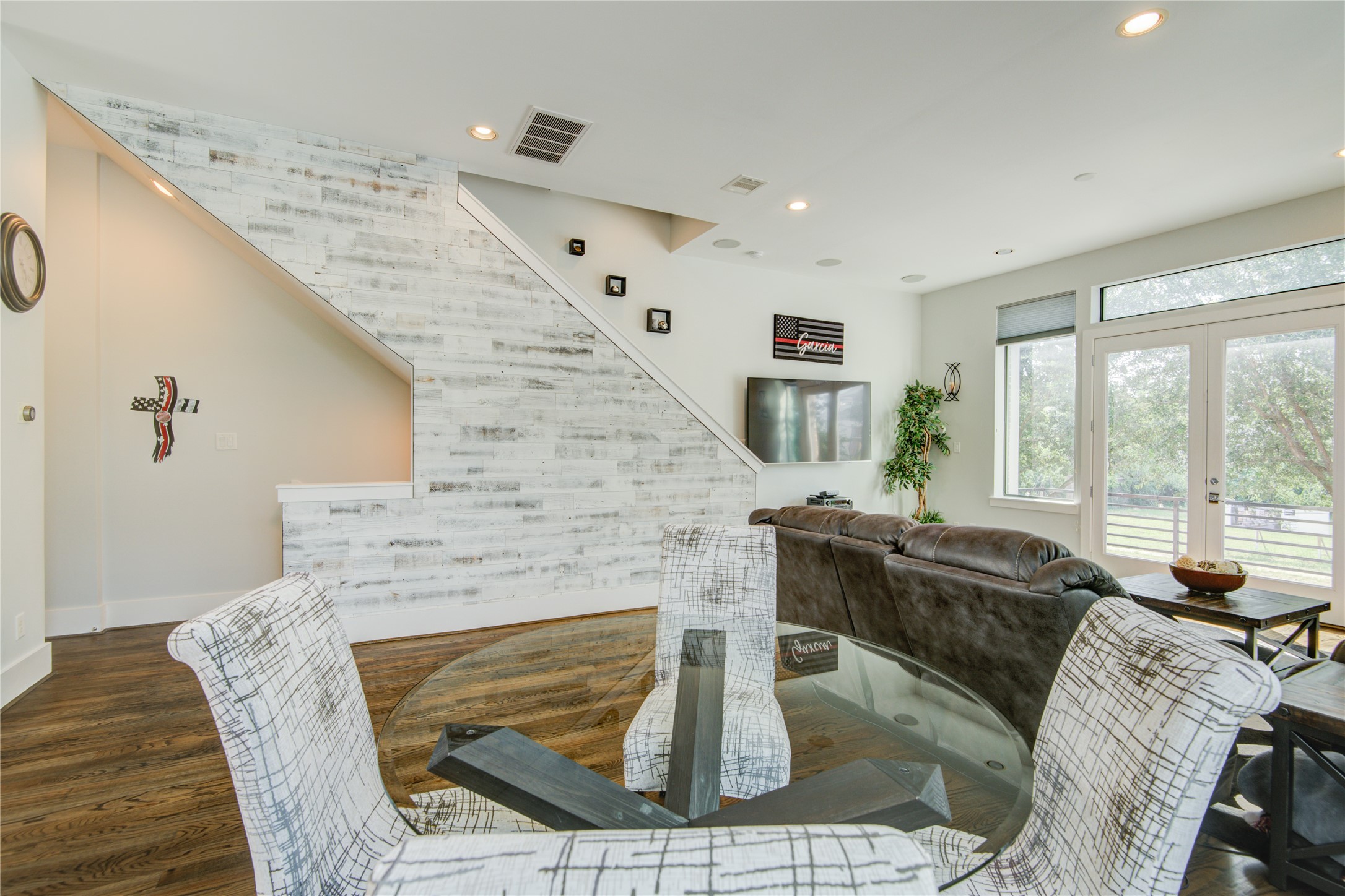 1401 Nagle Street Houston, TX 77003 - Photo 14 of 31 a living room with furniture a large window and a fireplace