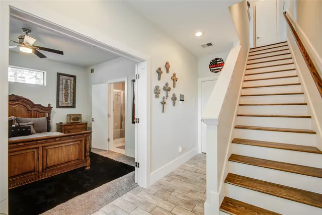 a view of a bathroom with sink and mirror