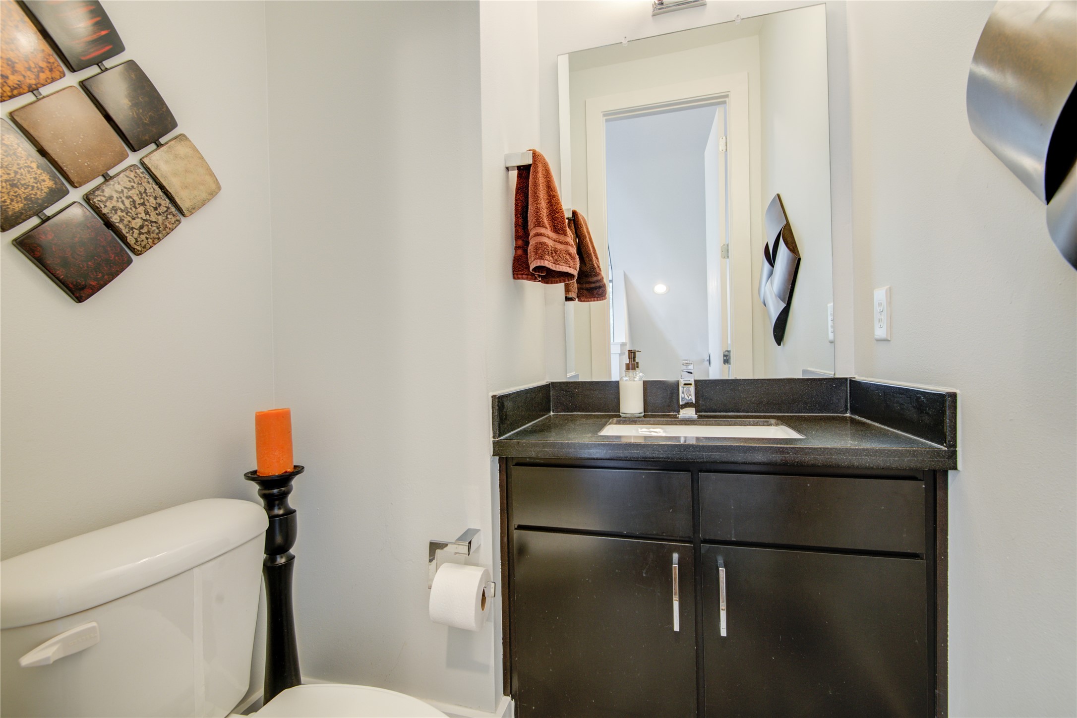 1401 Nagle Street Houston, TX 77003 - Photo 7 of 31 a bathroom with a sink and mirror with toilet