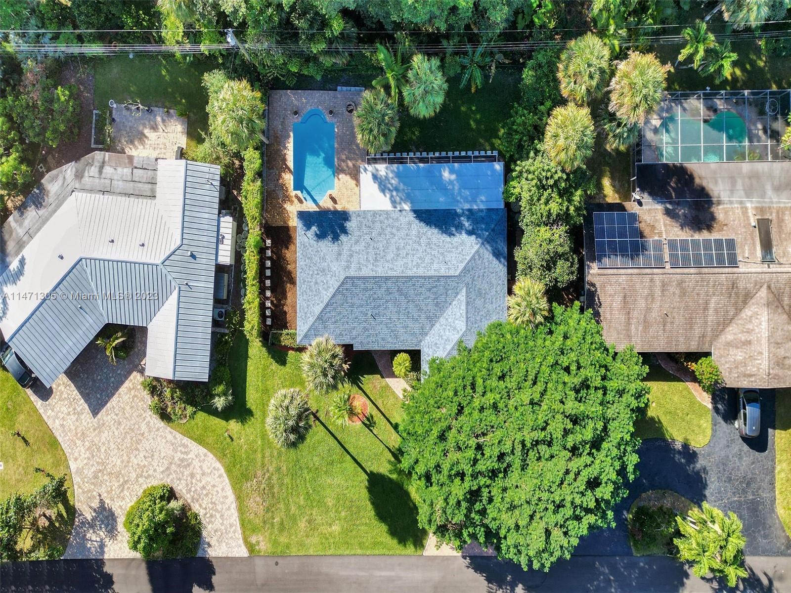 2028 South Conference Drive Boca Raton, FL 33486 - Photo 42 of 62 an aerial view of a house with a garden and plants