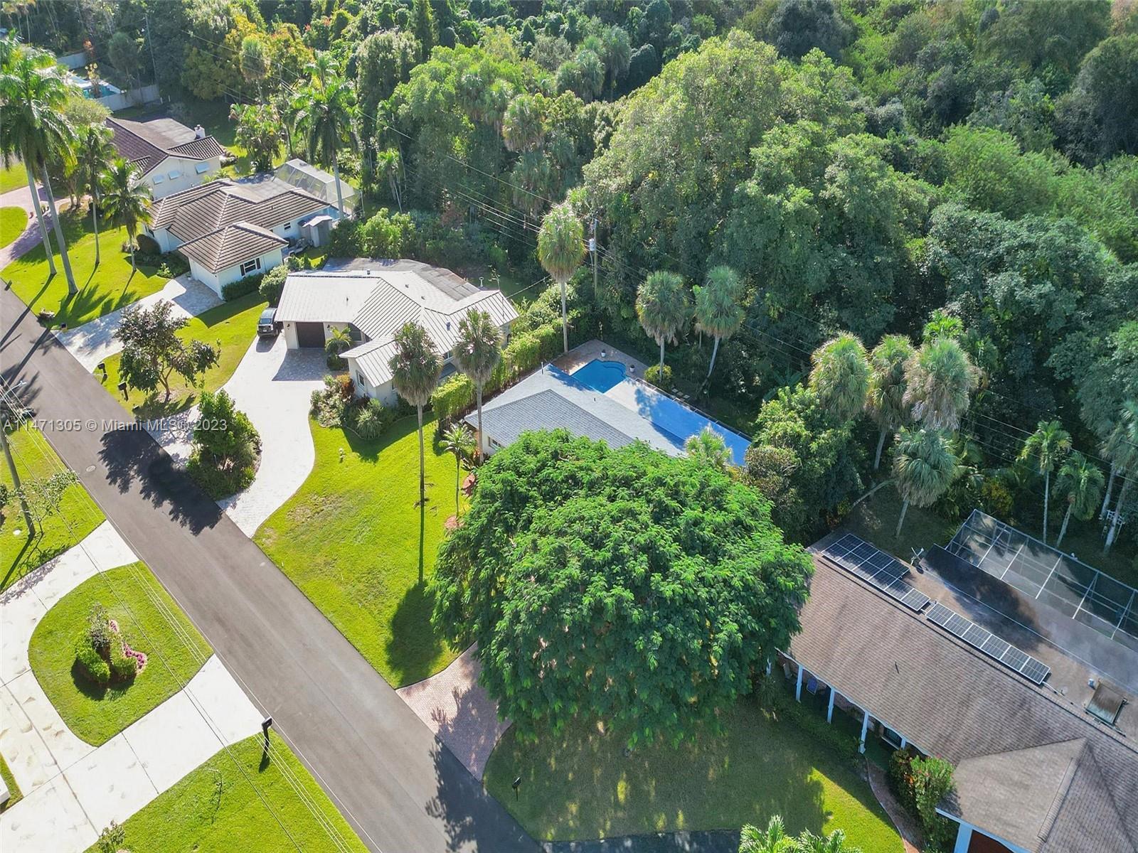 2028 South Conference Drive Boca Raton, FL 33486 - Photo 47 of 62 an aerial view of residential houses with outdoor space and swimming pool