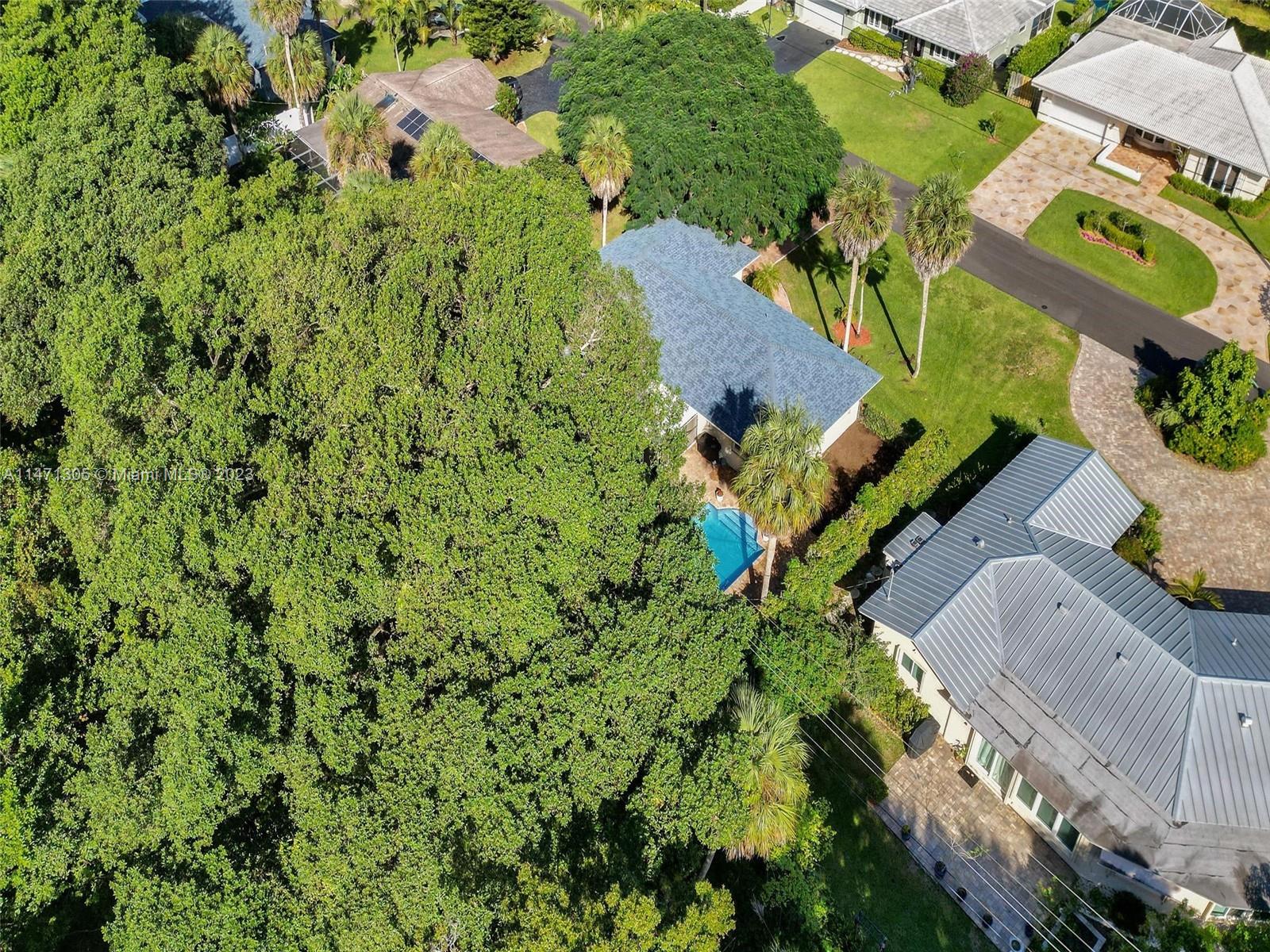 2028 South Conference Drive Boca Raton, FL 33486 - Photo 51 of 62 an aerial view of a house with a yard