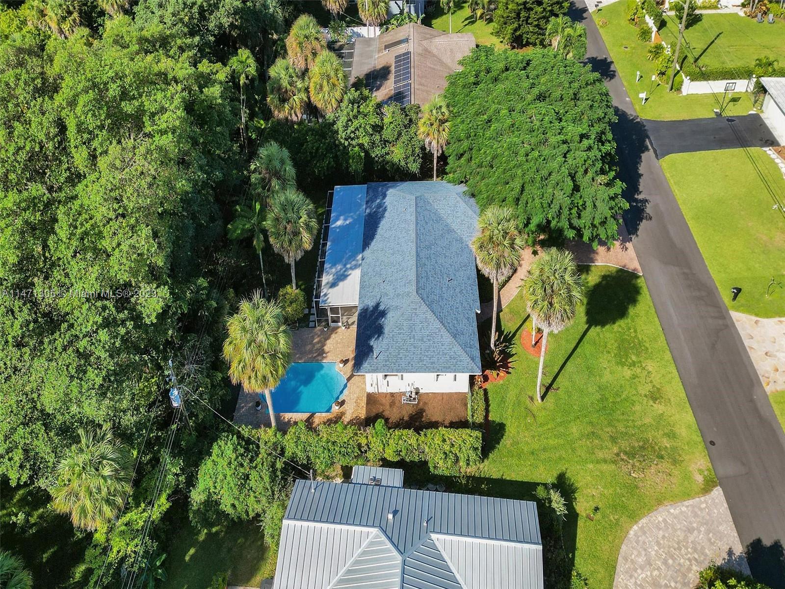 2028 South Conference Drive Boca Raton, FL 33486 - Photo 52 of 62 an aerial view of a house with a garden